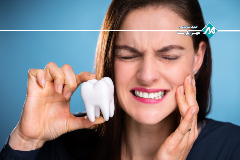 علت درد زیر روکش دندان چیست؟